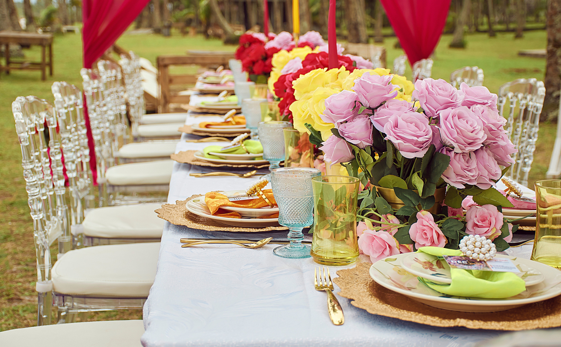 Pink Roses in Clear Glass Vase on Table